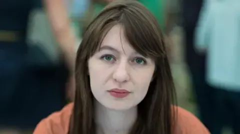 Sally Rooney claims she is unable to enter the UK due to legal concerns